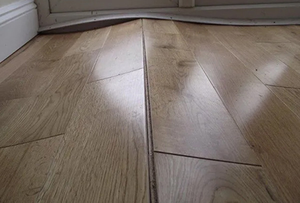 sàn vinyl bị cong vênh